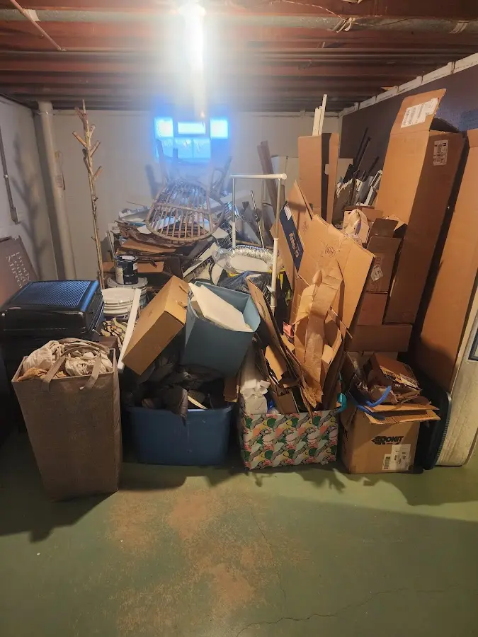 Roll-off dumpster container at job site for 15 Yard Dumpster Rental in Johns Creek